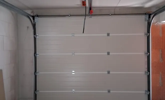 Mise en place d'une porte de garage sectionnelle sur Libourne , Bordeaux, Moderne Menuiserie 33